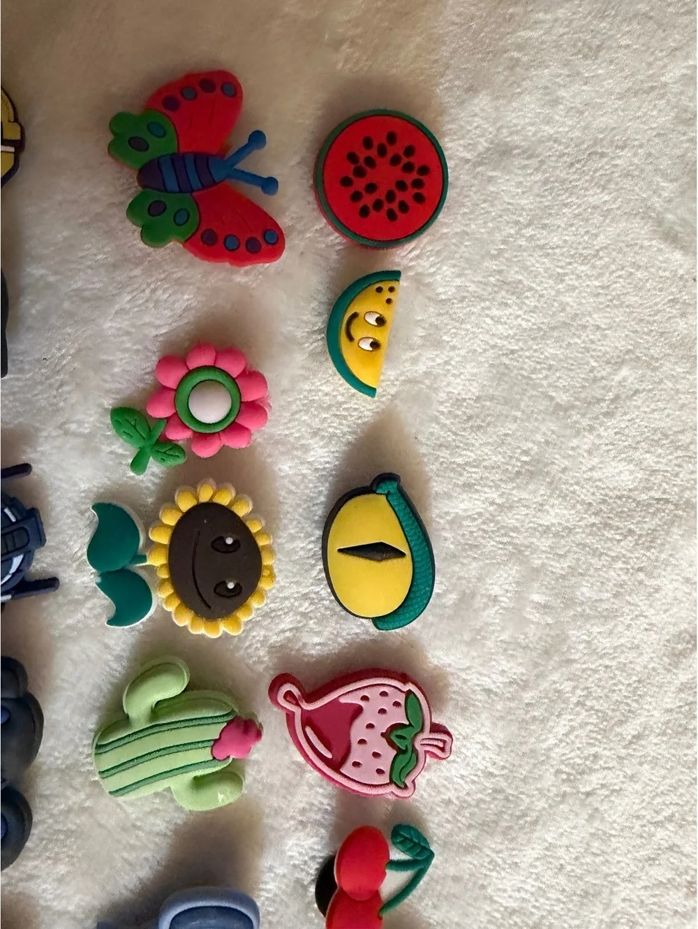 Jubbitz collection of colorful cartoon-themed shoe charms